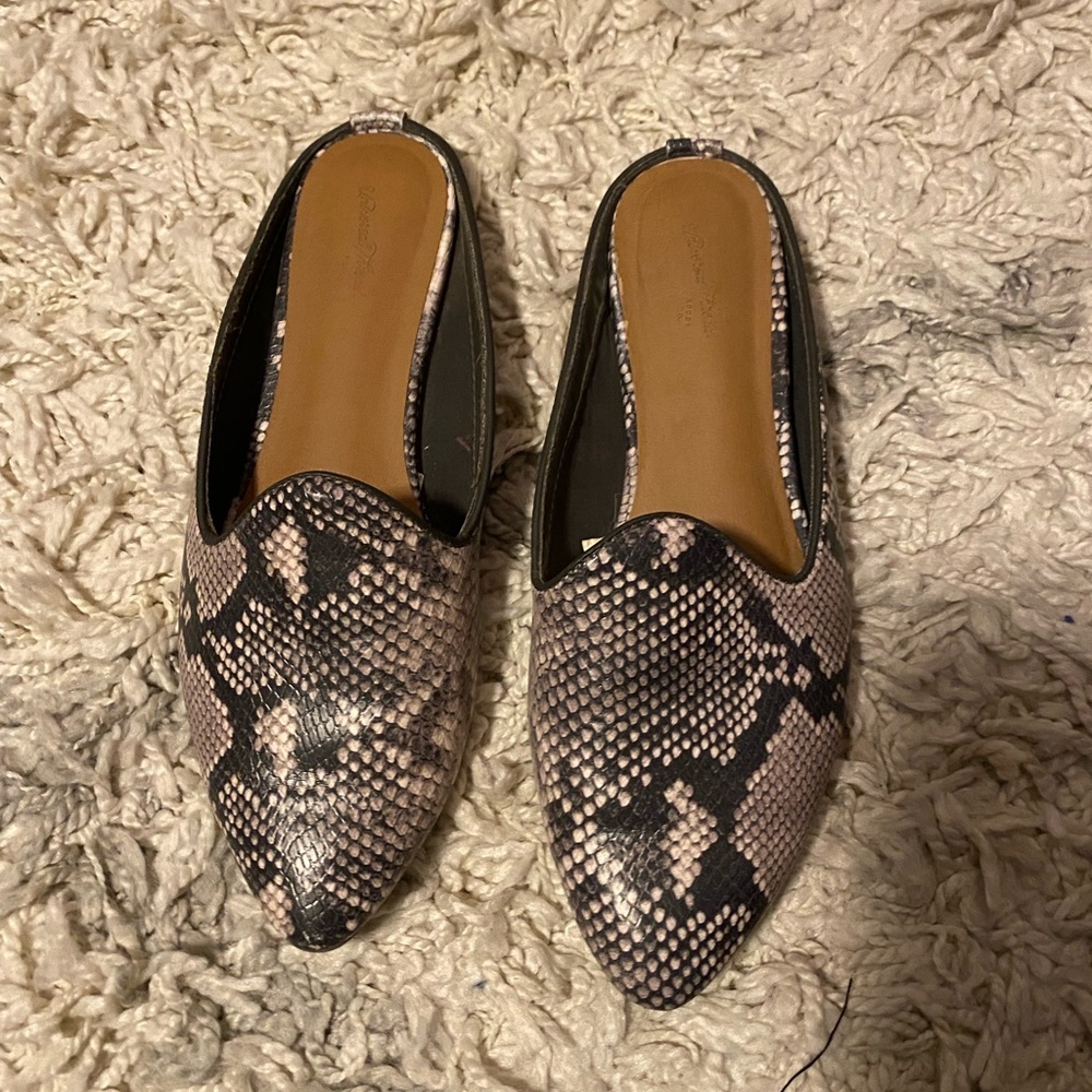 Snake print slip on shoes